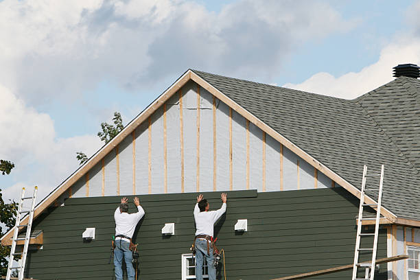 Professional Siding technician working in Calvin, PA